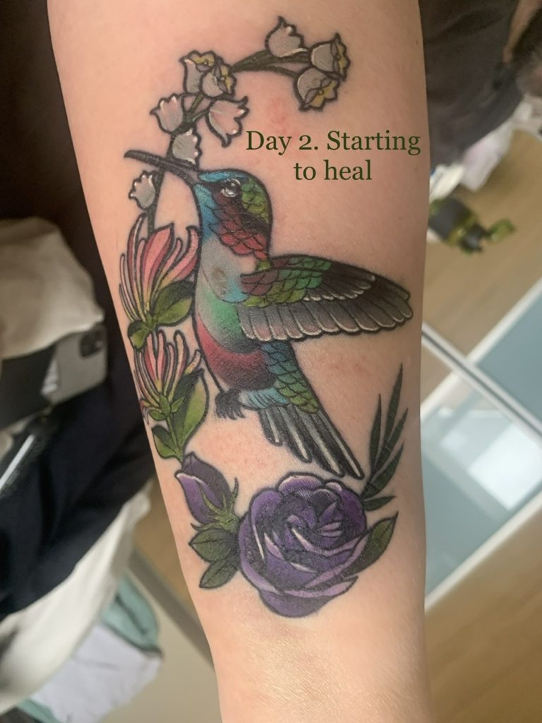 My tattoo - a hummingbird surrounded by flowers