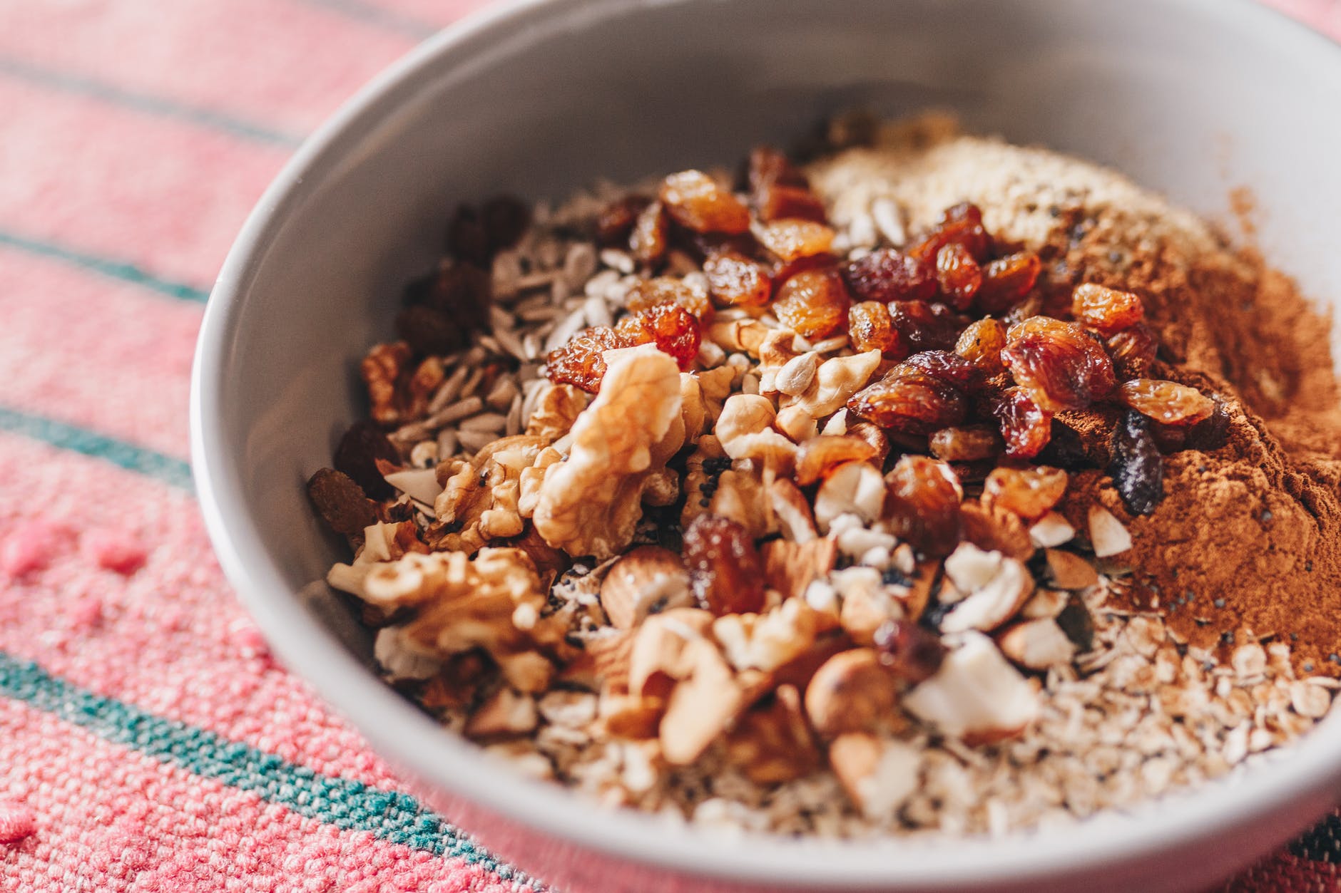 oats in white ceramic bowl - foods that boost energy