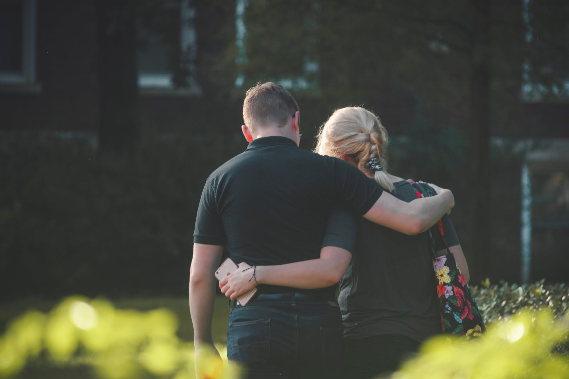 couple walking toward building learn to love yourself